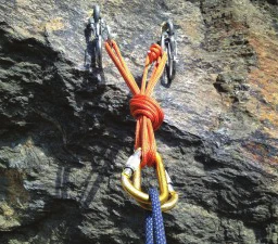 A unidirectional anchor built on two bolts with cord and a master point knot